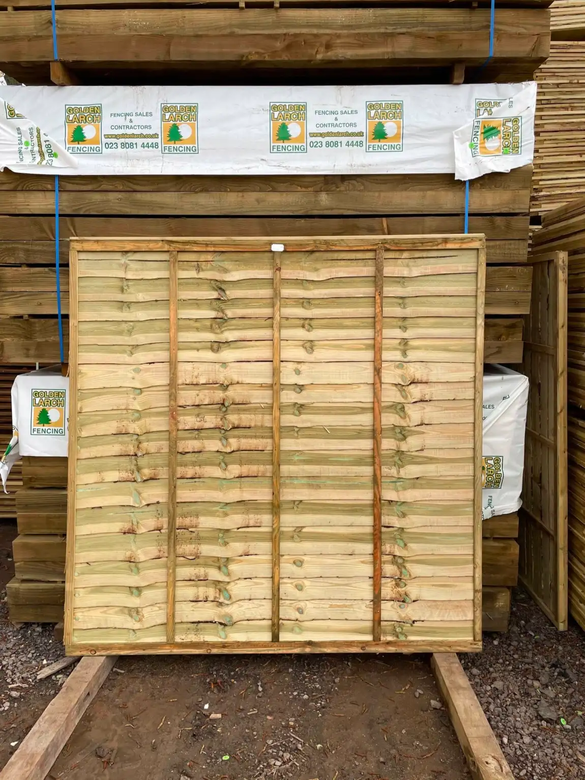 Lap fence panels for sale at Golden Larch Fencing.